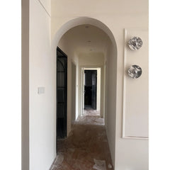 Modern hallway with two chrome marble wall lamps from YH Lamps, elegant interior lighting