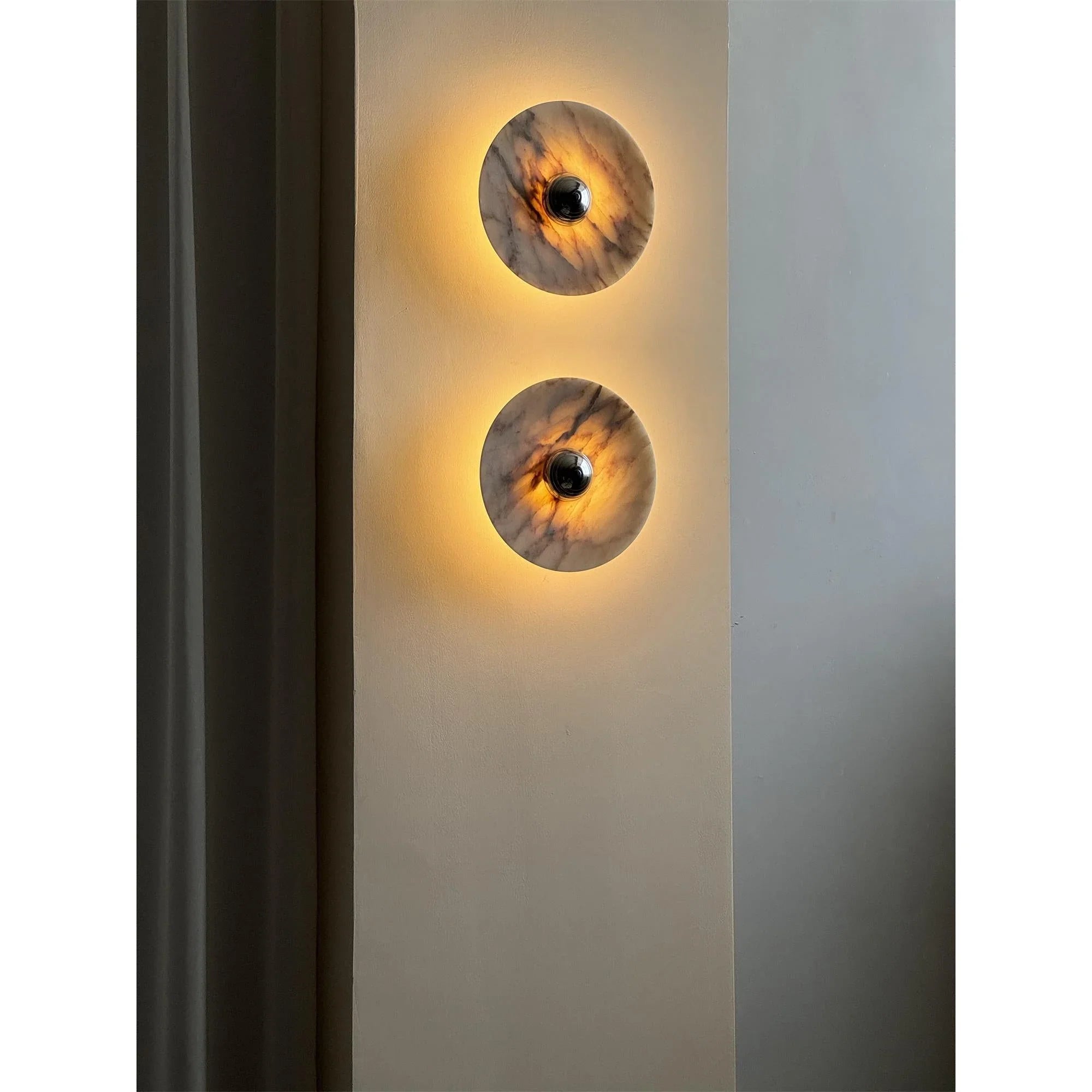 Modern marble wall sconces with warm LED light on neutral wall, YH Lamps home lighting