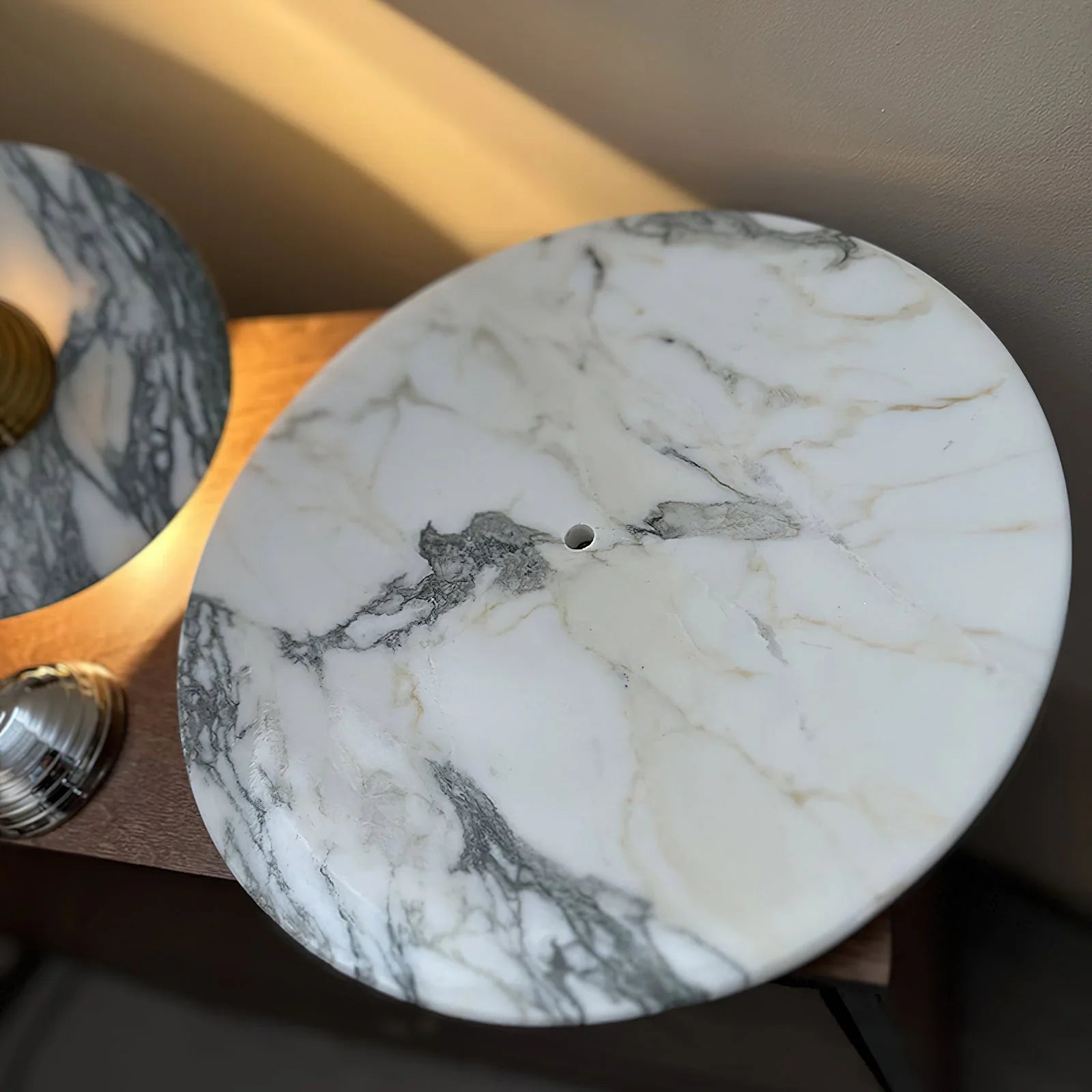 Modern marble wall lamp with chrome accents on a neutral background, YH Lamps