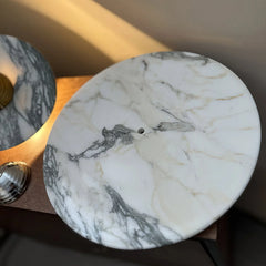 Modern marble wall lamp with chrome accents on a neutral background, YH Lamps