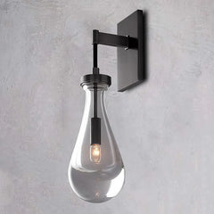 Modern raindrop glass wall sconce with black mount by YH Lamps, elegant indoor lighting