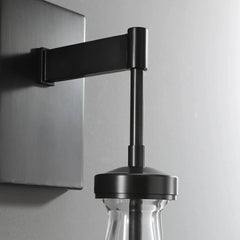 Modern black metal wall sconce with clear raindrop glass shade by YH Lamps