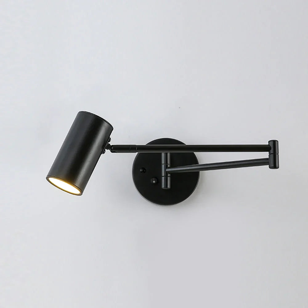 Modern black swing arm wall lamp with cylinder shade and wall switch, minimalist design