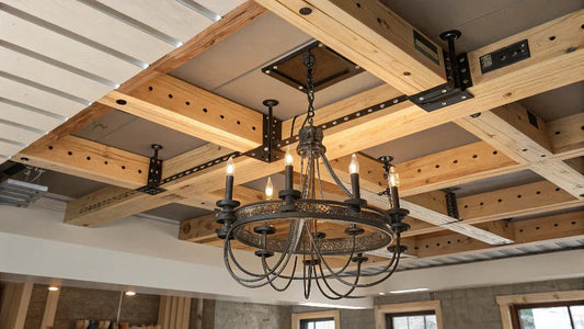 Modern black chandelier hanging from exposed wood beam ceiling, designer lighting for homes